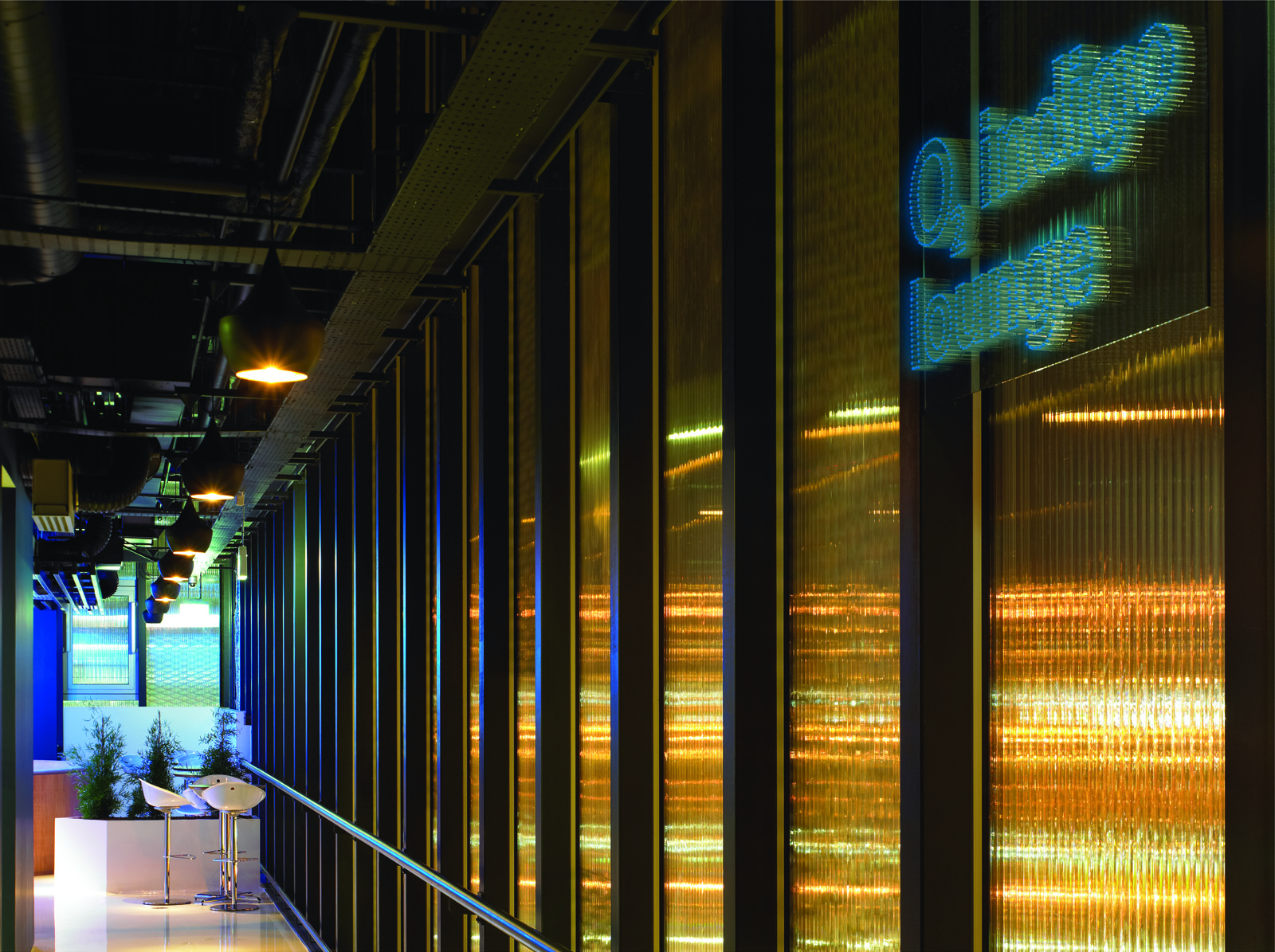 Once off the elevator, a sign of glowing perspex rods signals entry into the lou